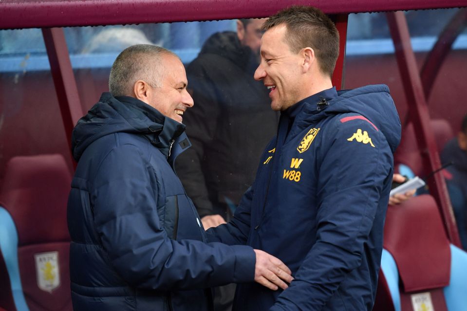  Aston Villa assistant manager Terry embraces Spurs boss Mourinho