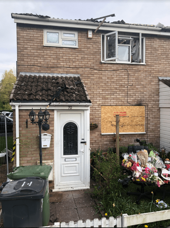  Tributes were left outside the house after the tragic accident