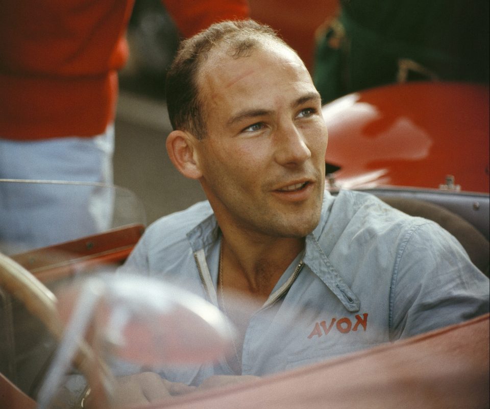  Pictured sitting inside a Maserati in 1955