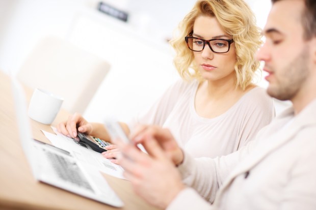 Couple looking at laptop