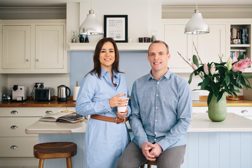  Mr Raab at home in Surrey with his wife