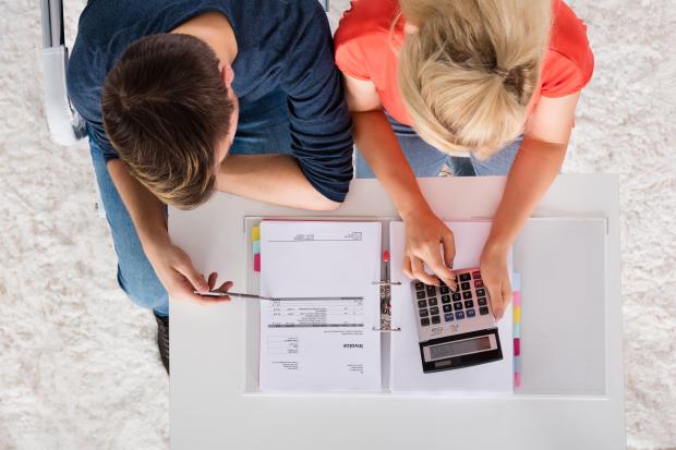 Couple looking at bills