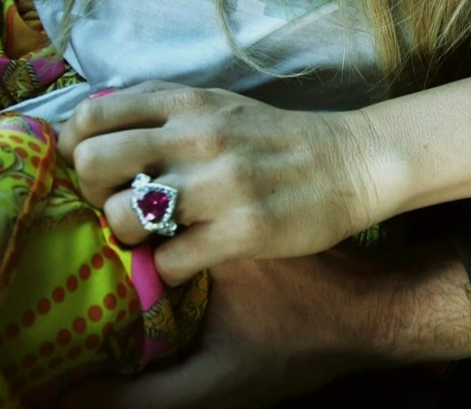  She sported a pink heart-shaped jewel on her ring finger while they were together