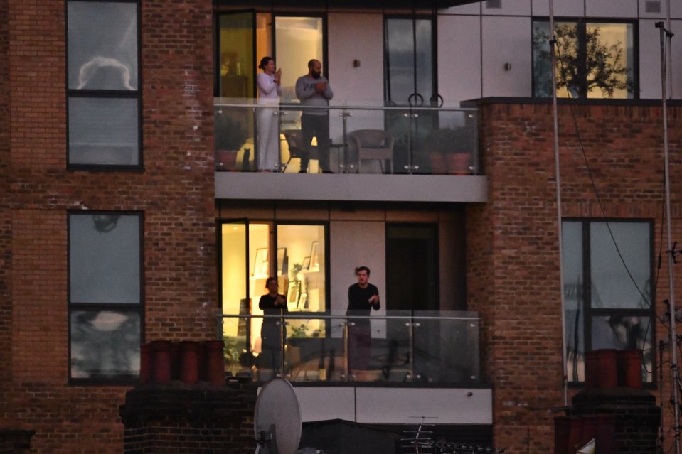  People in West London stood on their balconies to clap for the NHS and other key workers