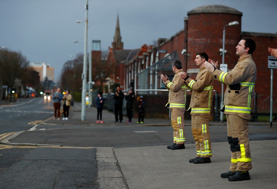  Firefighters stood at the front of their stations and clapped