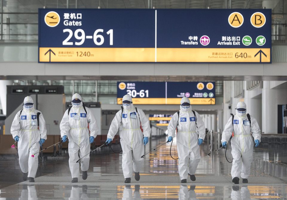  The airport shown being sprayed with disinfectant in Wuhan - the epicentre of the killer bug