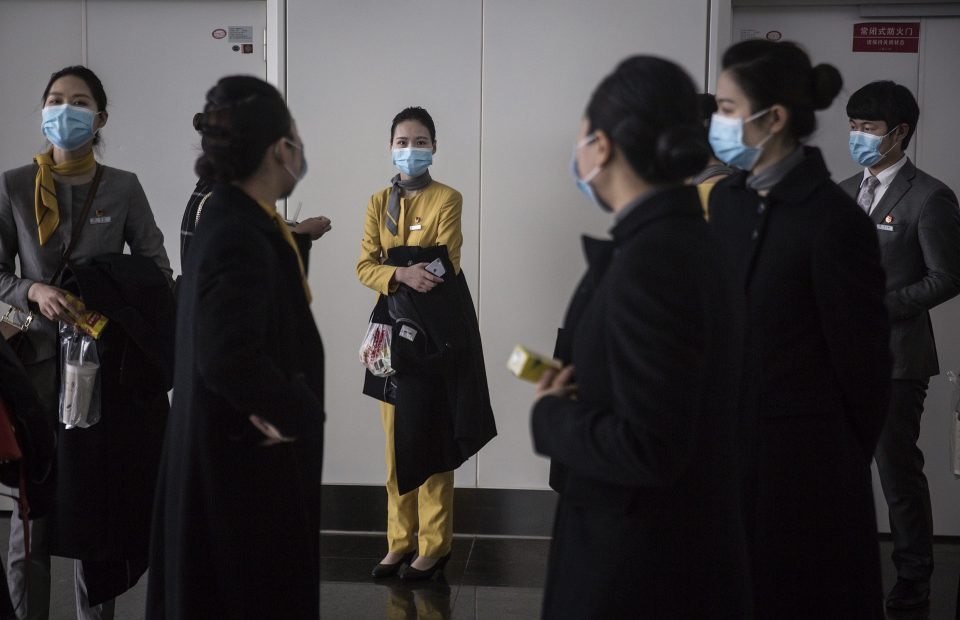  Staff preparing for the airport's re-opening on April 7, Wuhan, Hubei province in China