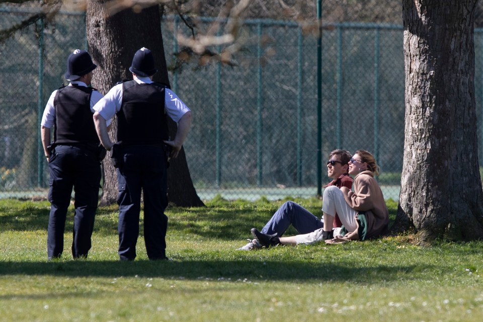  Cops question sunbathers in Greenwich Park earlier today