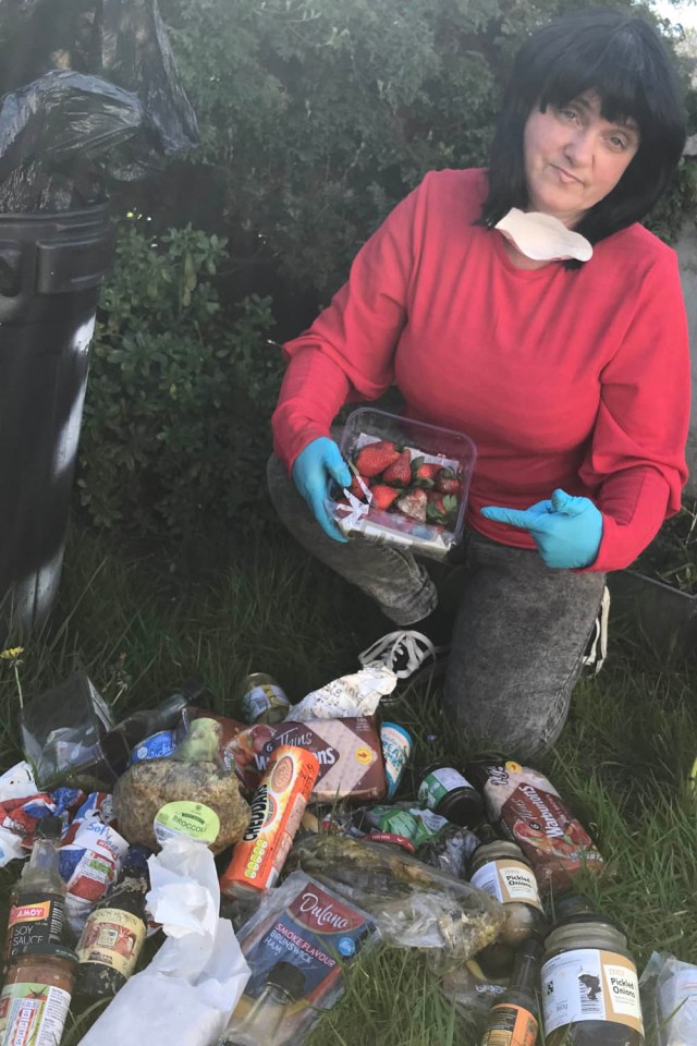  Emmie with some of the food say says she's been 'forced' to bin