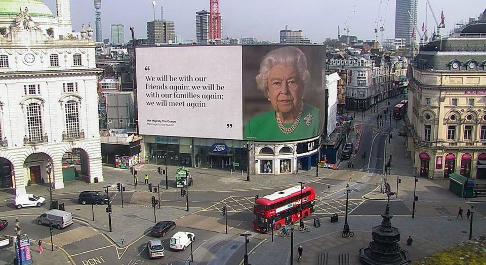  Piccadilly Circus in central London is projecting the Queen's inspiring message on to the famous advertising billboards