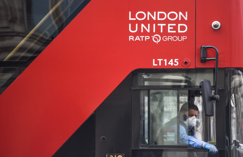  A bus driver wears a mask at work to protect himself from the coronavirus