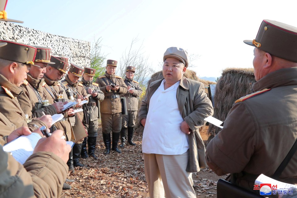  Kim Jong-un at a missile test in pictures released by North Korean media on April 10