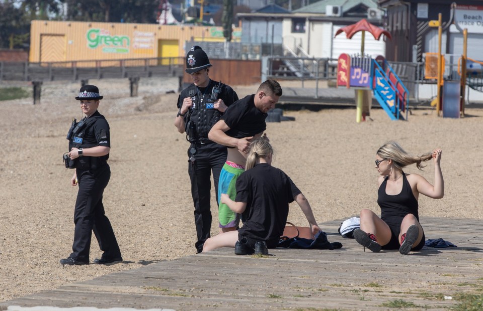  Police were observed clearing the beach of sunbathers at Southend on Sea