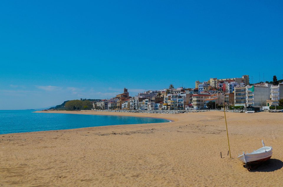  An empty beach in Sant Pol de Mar, Spain. A new government plan does not see tourism, culture and leisure businesses opening until the end of the year