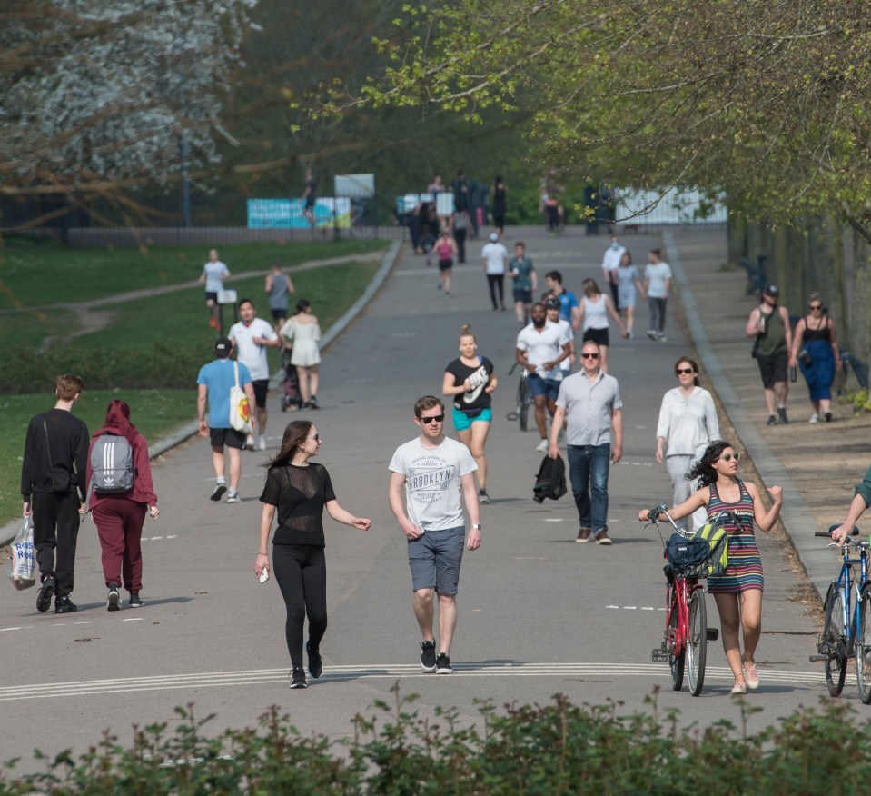  People strolling through Victoria Park in London this morning - ideally keeping their distance and only staying out for an hour