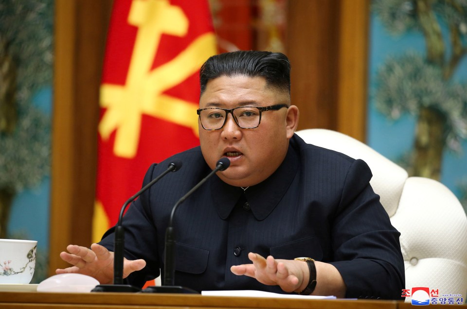  Kim Jong-un during a meeting with officials in North Korea. Picture released on April 11