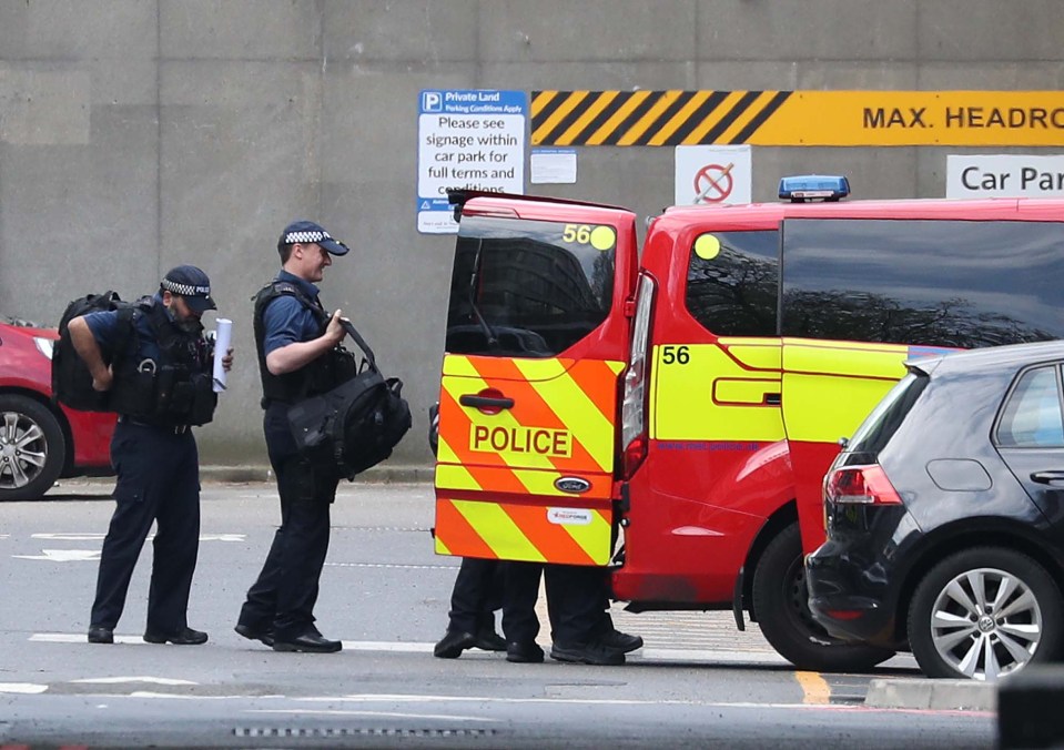  Police leaving St Thomas' Hospital in central London where Prime Minister Boris Johnson was being treated for coronavirus