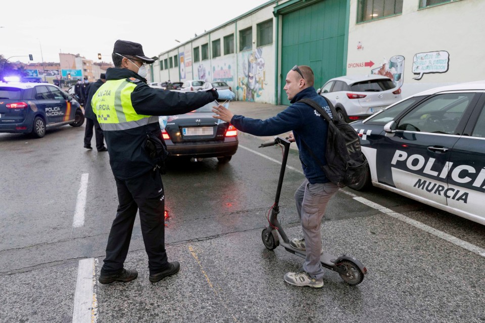  Civil Guards hand in masks to drivers in Murcia, Spain