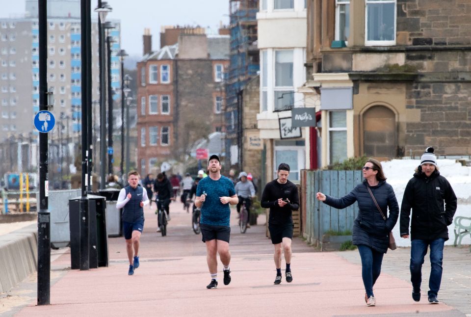  People exercise along the promenade at Portobello Beach, Edinburgh