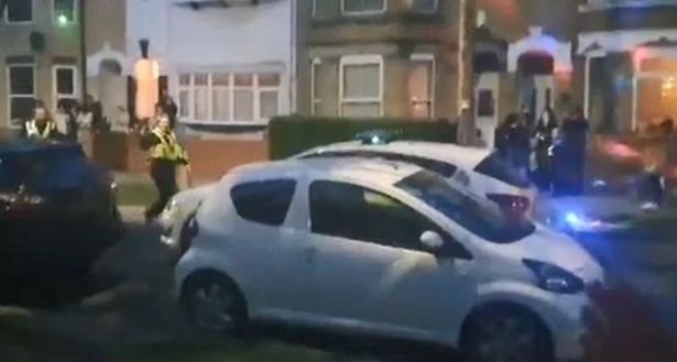  Police attend the street party in Hull which was allowed to continue because lockdown rules were not broken