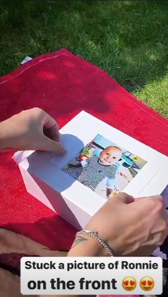 She glued a snap of adorable baby Ronnie to the top of the box