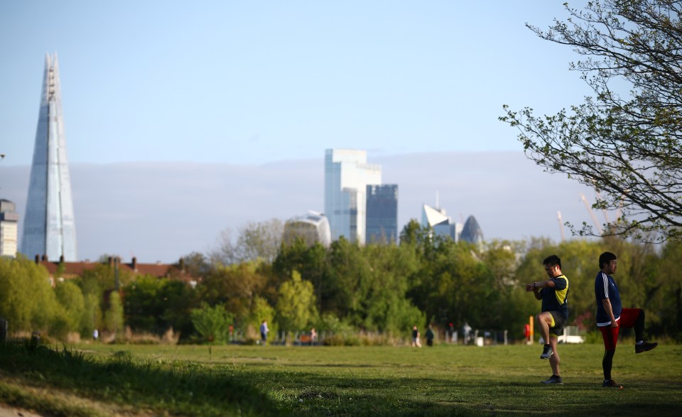  People exercise in Burgess Park as the UK continues its fourth week of lockdown