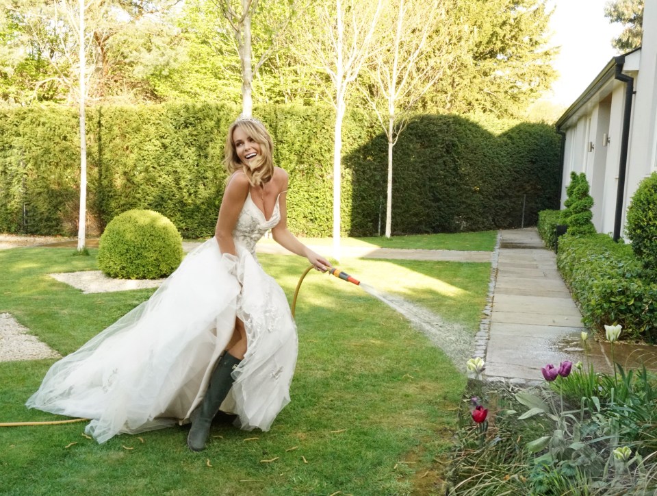  Amanda hosed flowers and showed off her wellies