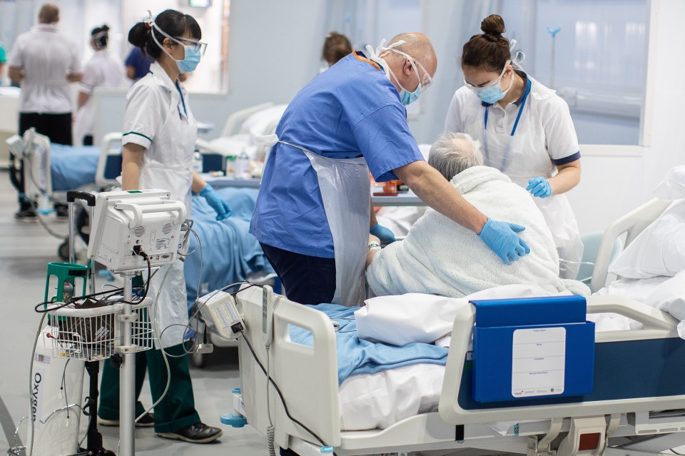  Medics tend to patients at the NHS Nightingale Hospital North West in Manchester