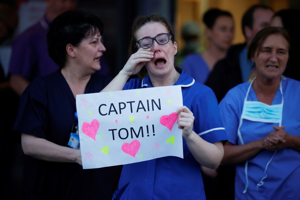  Nurse celebrates Captain Tom during claps for NHS