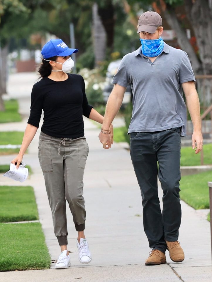  Meghan Markle and Prince Harry hold hands as they deliver food with the the non-profit organisation ‘Project Angel Food’ in LA last week