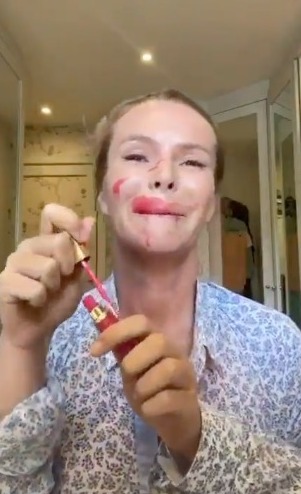  Amanda is seen smeared in red lipstick