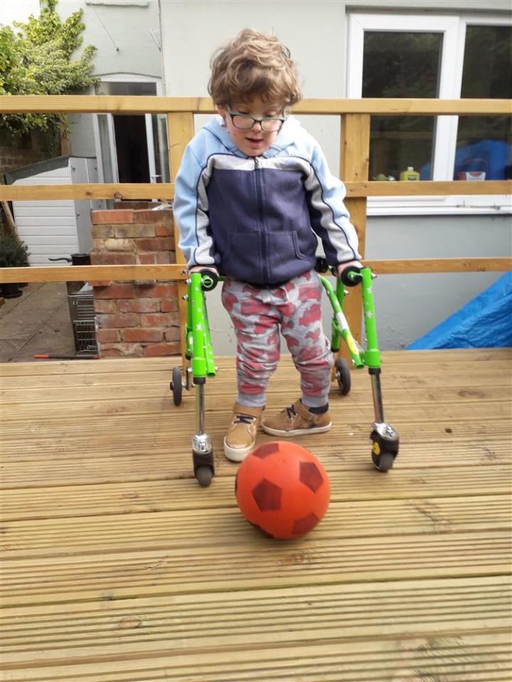  Frank Mills, 6, struggles to walk short distances