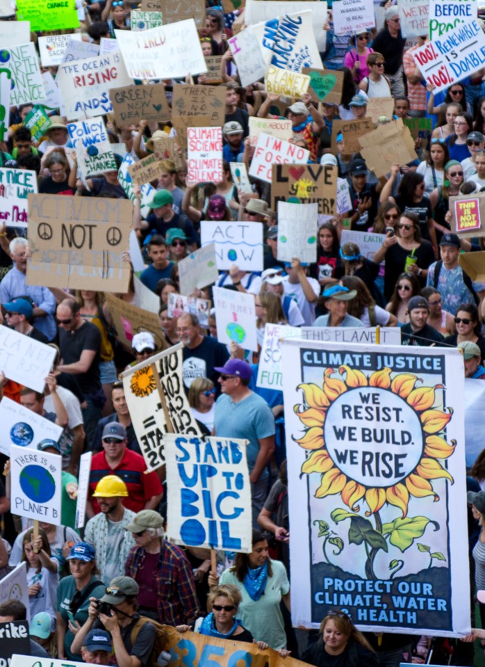  'A crowd of demonstrators protesting the government’s inaction with regard to climate change' by @josephrrouse