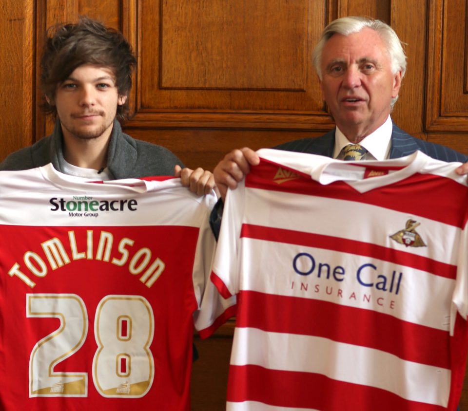  Louis Tomlinson of One Direction with former Doncaster chairman John Ryan