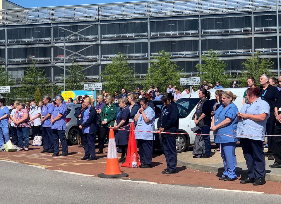  The popular doctor was clapped and cheered by hundreds of his colleagues outside Whiston Hospital