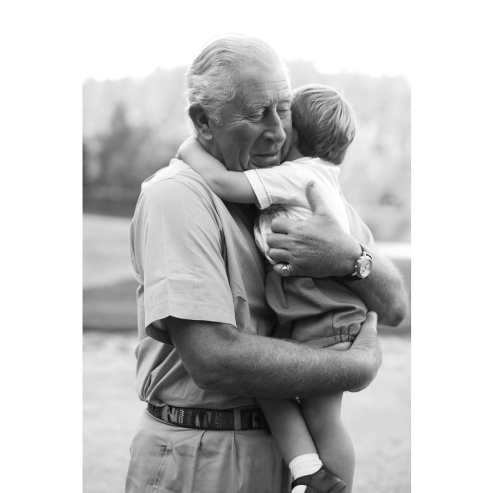  Clarence House released a new photo of Prince Louis with his grandfather Prince Charles to mark his second birthday. 