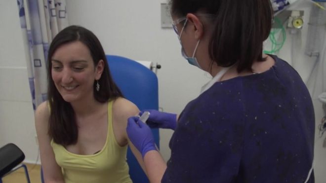  Elisa Granato being injected with the vaccine