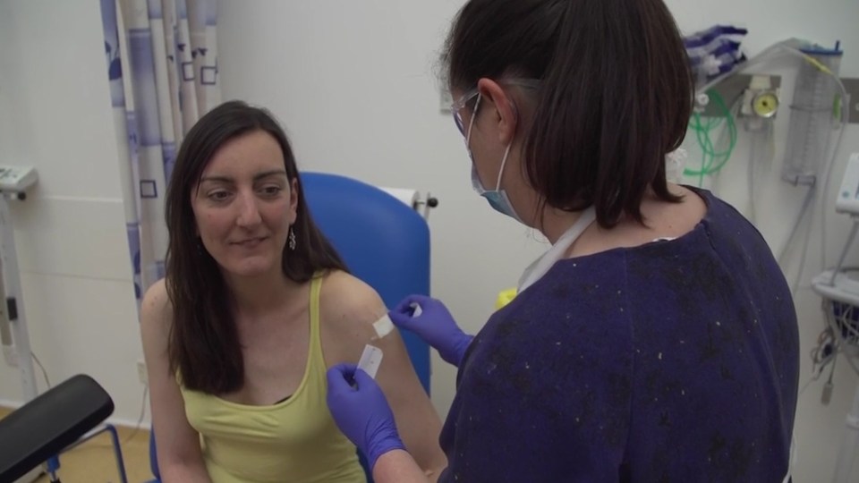  Microbiologist Elisa Granato, 32, being injected as part of human trials in the UK for a coronavirus vaccine