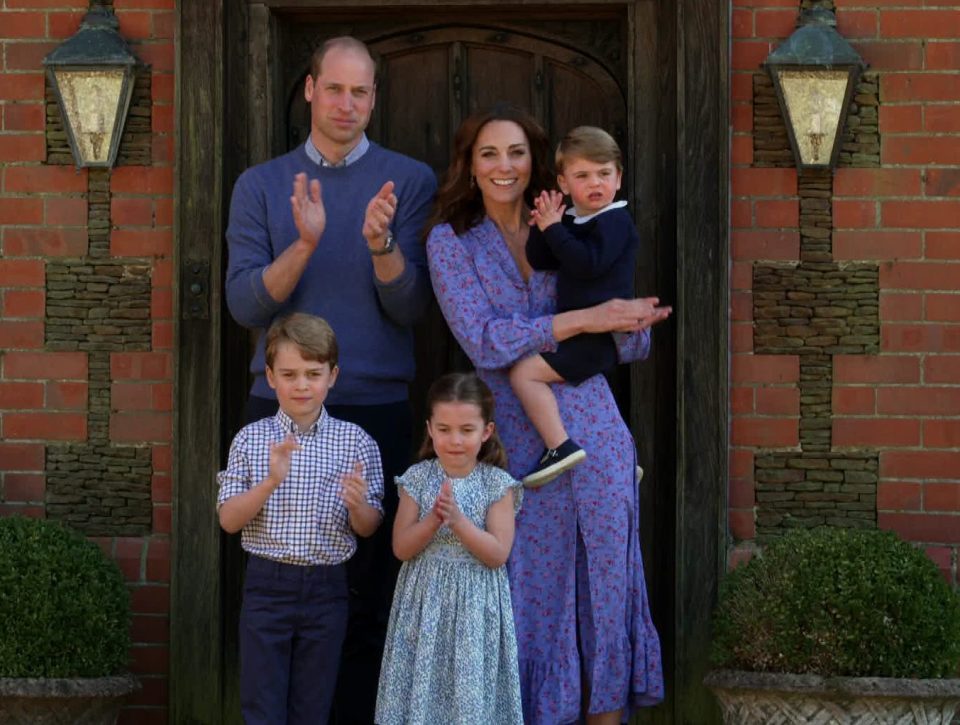  Prince William, his wife Kate Middleton, and their children George, Charlotte and Louis join in the Clap for Carers