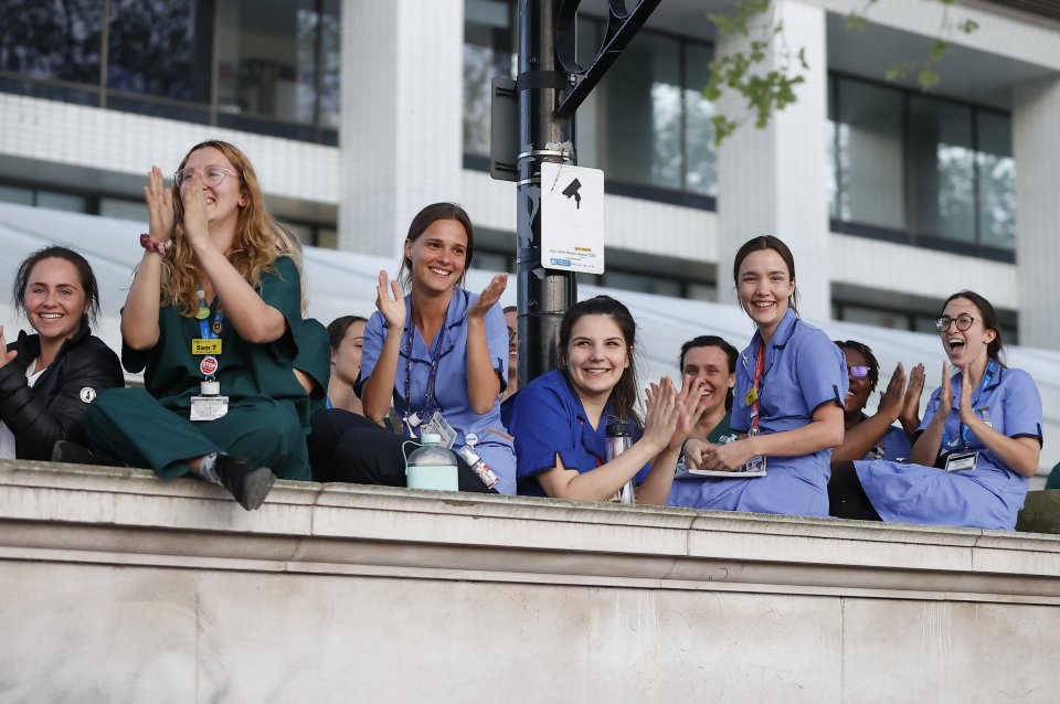  Hospital workers, nurses and doctors gather outside St Thomas' Hospital this evening