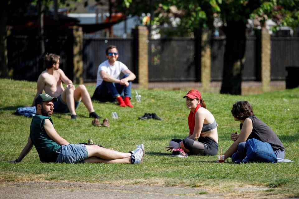  People enjoy warm weather at London Fields on April 24, during the national lockdown