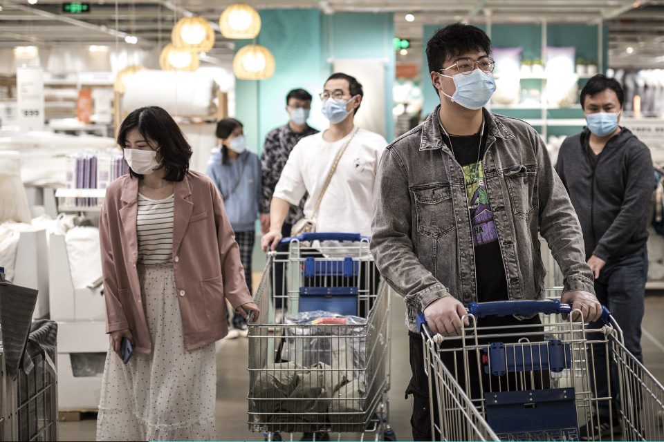  Customers wear protective masks while visiting an IKEA store on April 25, in Wuhan, China