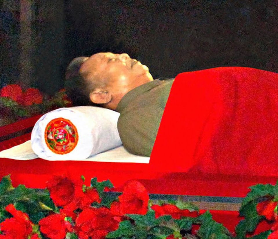  It is similar to photos of Kim Jong-il lying in state at his funeral in 2011