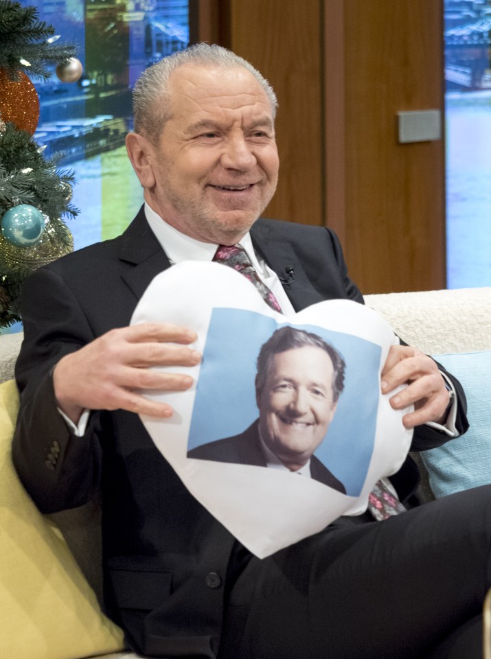  Lord Sugar previously jokingly posed with a cushion with Piers' face on