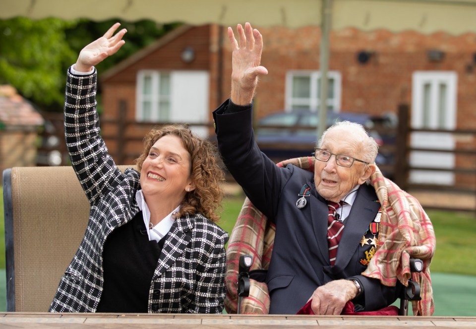  Captain Tom Moore waved to a Spitfire and Hurricane from RAF Coningsby in a spectacular flypast from his garden with his daughter Hannah