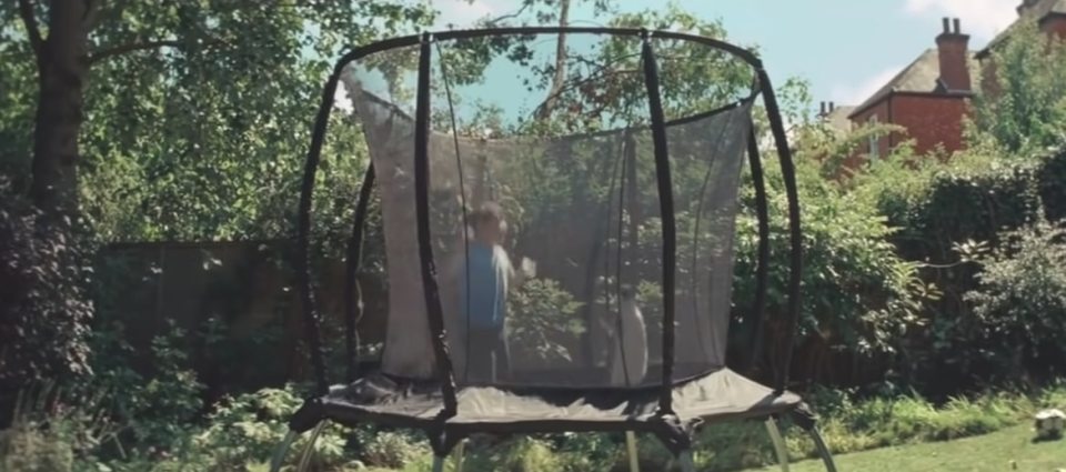  The little boy and his pet penguin play in the garden in the John Lewis ad