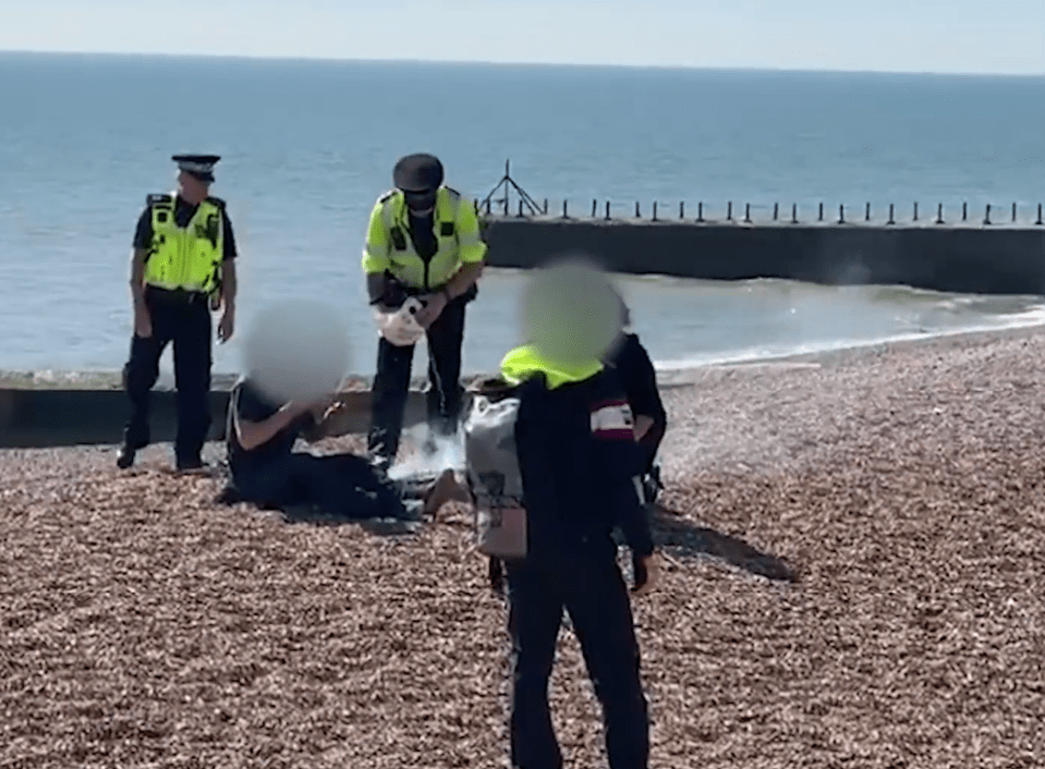  One careless pair in Hove near Brighton got a rude shock when a policeman used his helmet to pour water over their beach-side barbecue