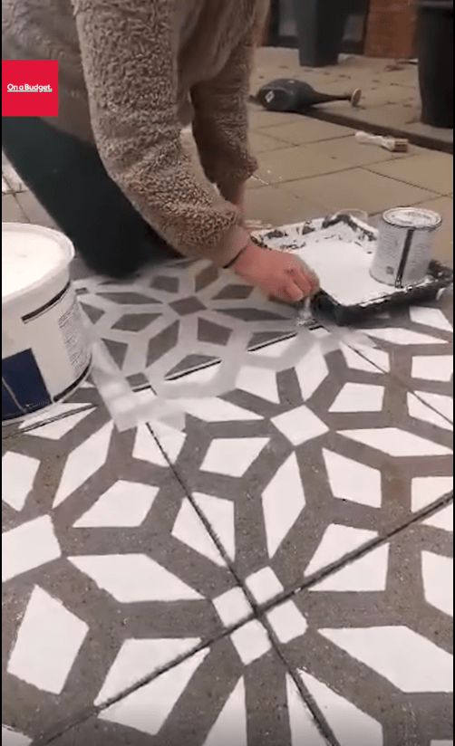 Tanya filmed herself painting over the stencil