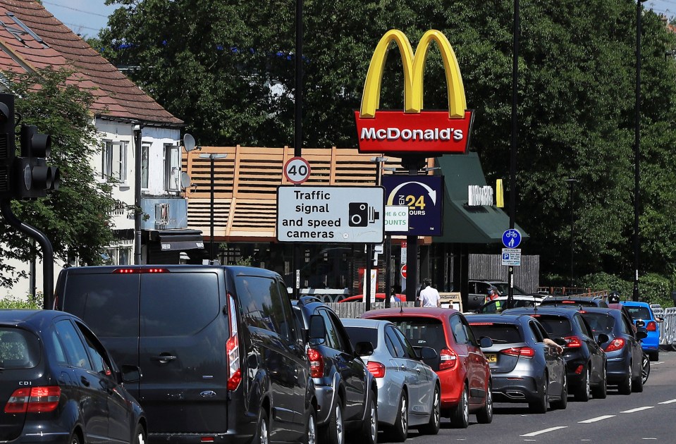 Queues to get into the McDonald's in Sutton, England yesterday 