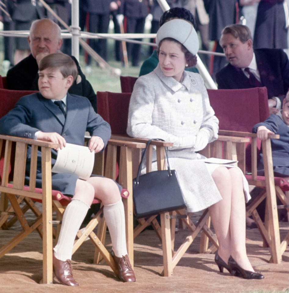 The Queen carries good luck charms from her children in her handbag, a royal expert has claimed